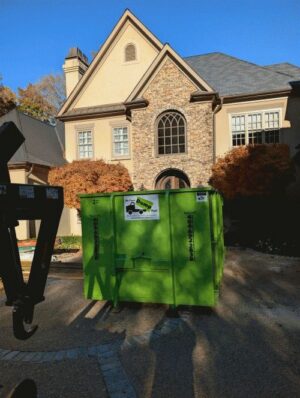 dumpster in atlanta residence driveway