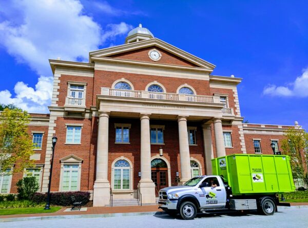 dumpster rental truck in downtown alpharetta