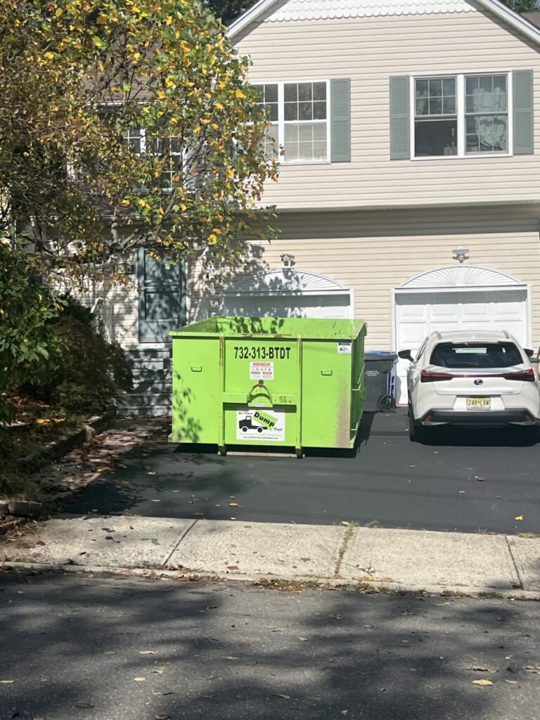 dumpster in central NJ driveway