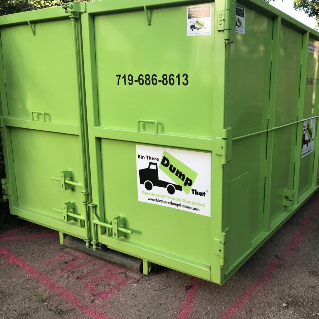 dumpster in tight driveway in Colorado Springs