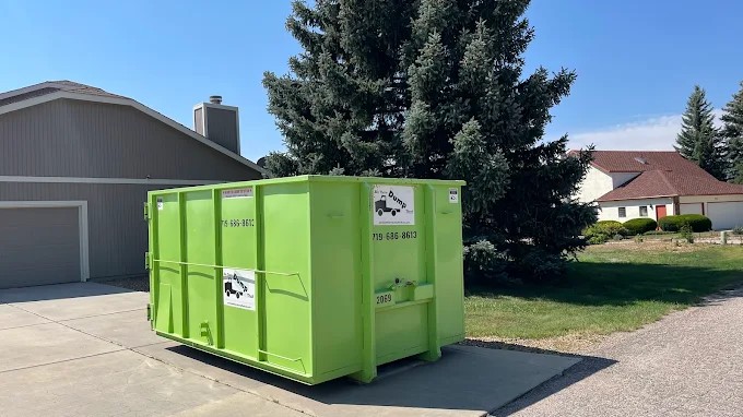Roll off dumpster rental in a Cimarron Hills CO driveway