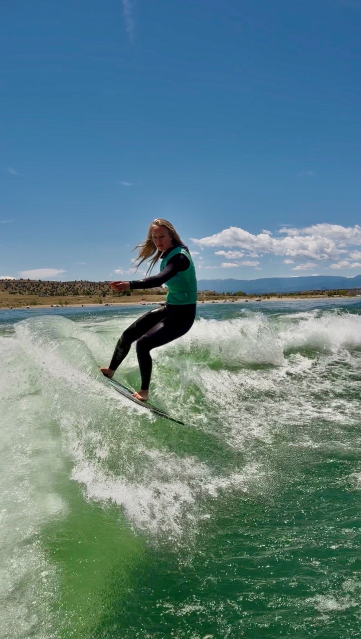 Rene Dinkel wakesurfing on a Colorado lake