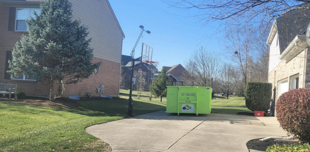 dayton oh dumpster rental in driveway