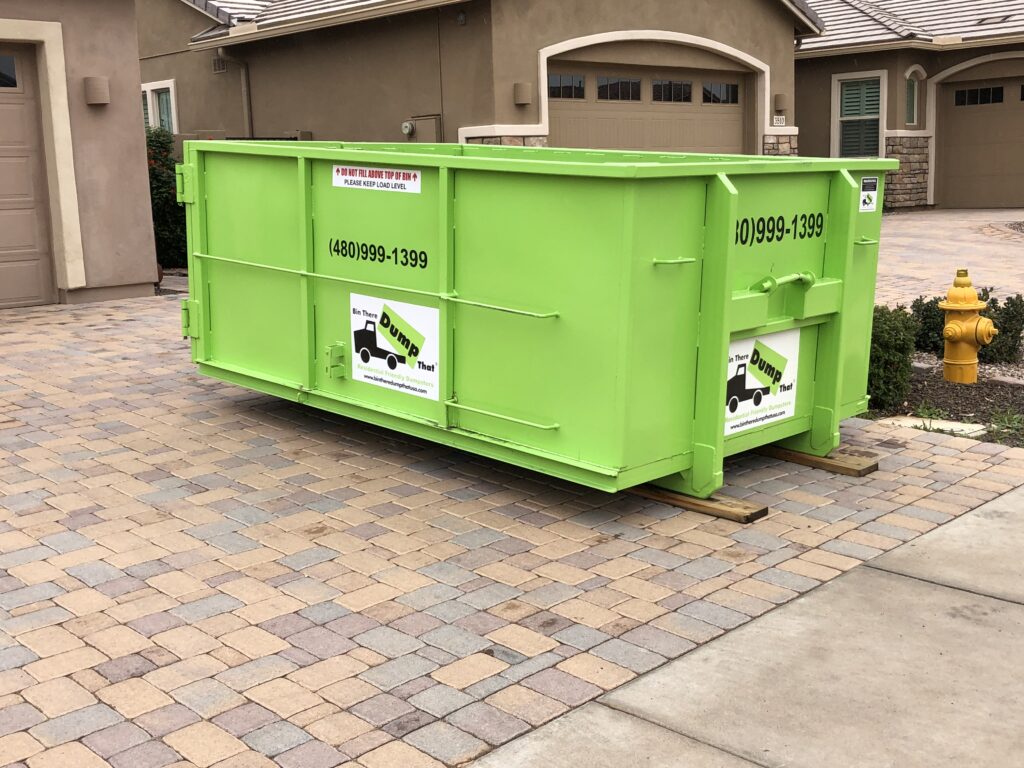 Small 10 Yard Dumpster in Short Driveway on Pavers