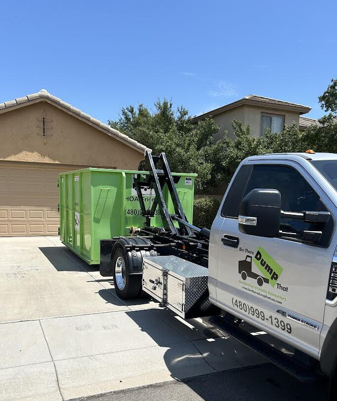 Custom 20 Yard dumpster delivery to residential home - dumpster placed on the concrete driveway.