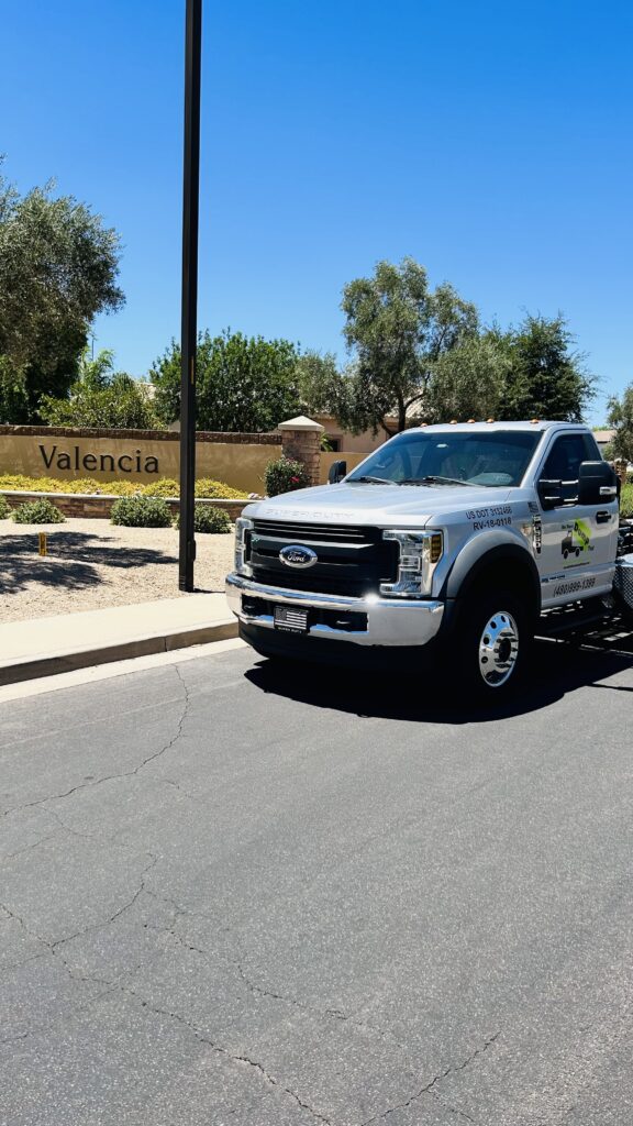 Bin There Dump That Truck In Front of Valencia Neighborhood Marquee in Gilbert